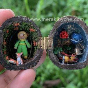 Miniature little Prince world inside a walnut