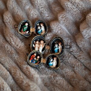 Miniature nativity scene inside a nutshell